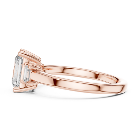 Emerald Cut Three-Stone Ring with Baguette Side Stones
