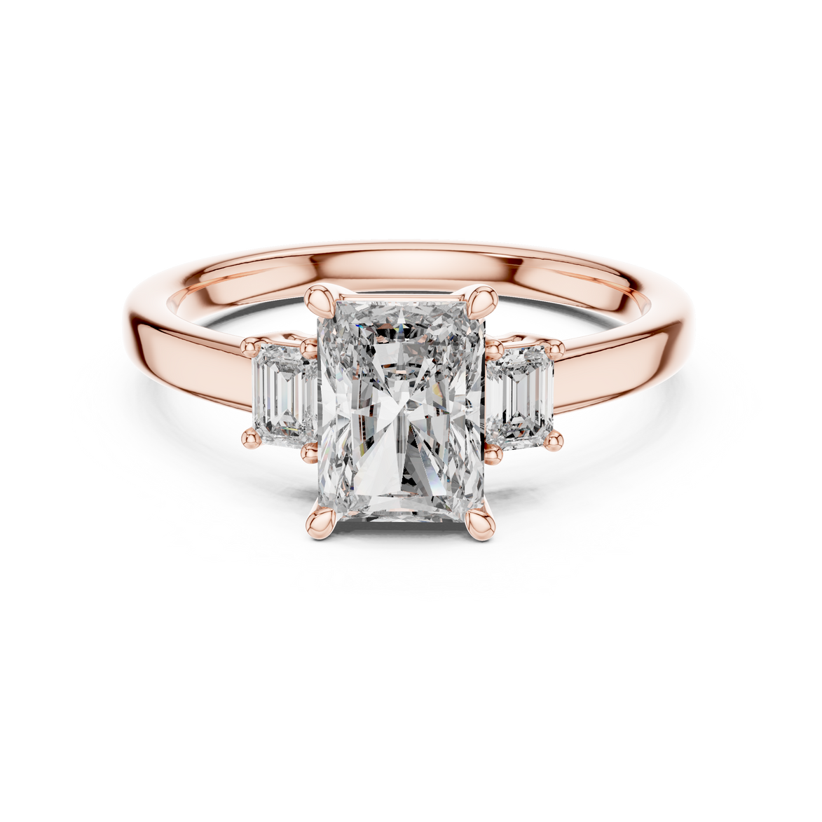 Emerald Cut Three-Stone Ring with Baguette Side Stones