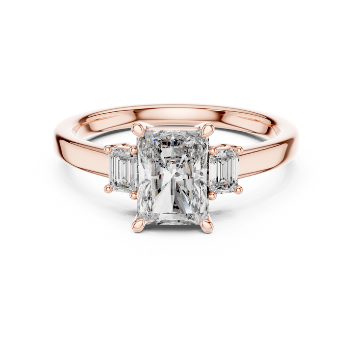 Emerald Cut Three-Stone Ring with Baguette Side Stones