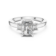 Emerald Cut Three-Stone Ring with Baguette Side Stones