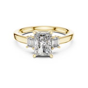 Emerald Cut Three-Stone Ring with Baguette Side Stones