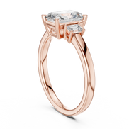 Emerald Cut Three-Stone Ring with Baguette Side Stones