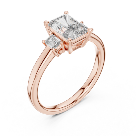 Emerald Cut Three-Stone Ring with Baguette Side Stones